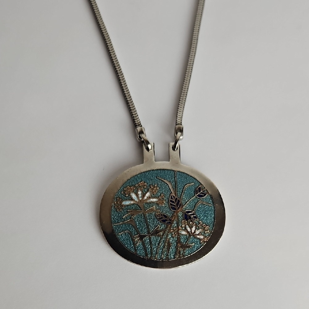 Silver Pendant Necklace with Textured Design
